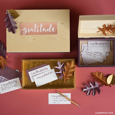 Small boxes decorated with fall leaves